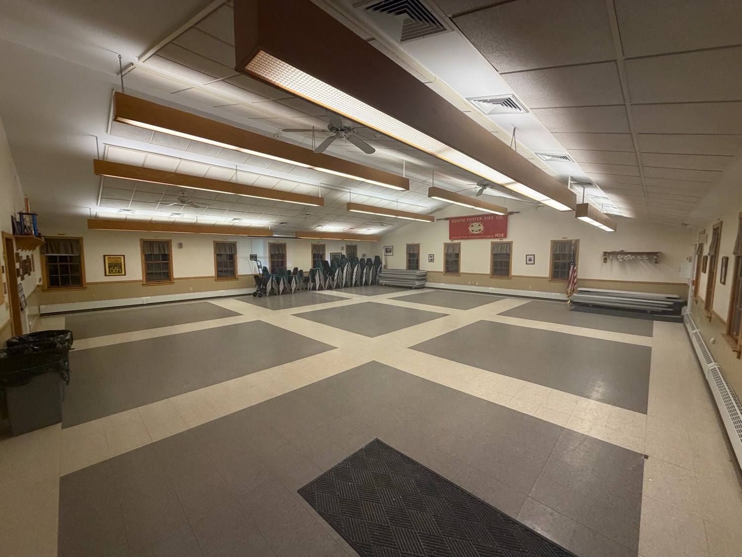 The main hall from the far end, under the company banner.